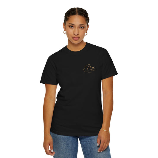 Forest Trail Tee in Black, front view worn by a woman in studio